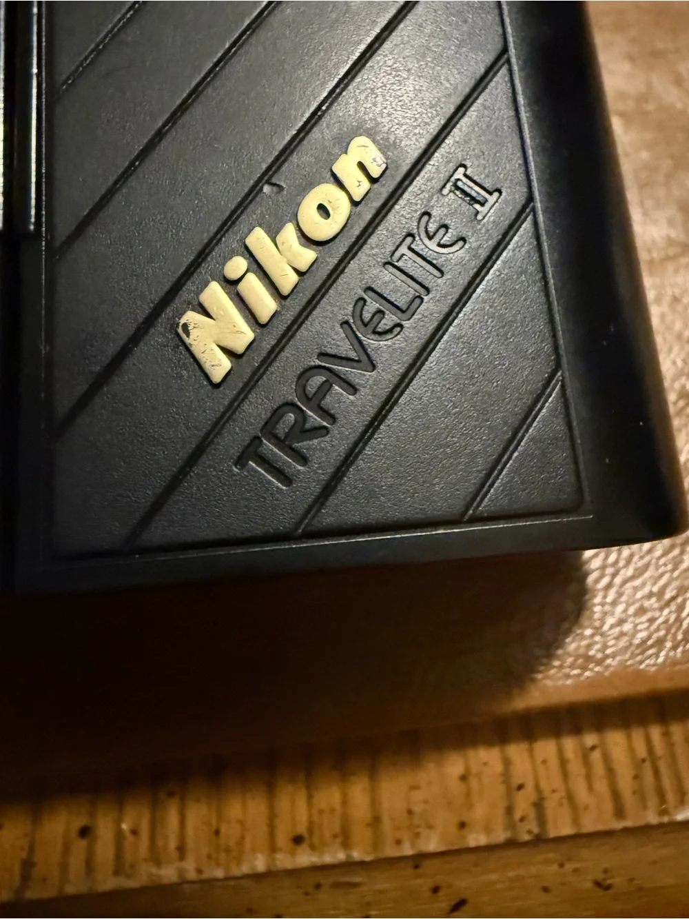 Nikon Black Compact Folding Binoculars with Gold Accents